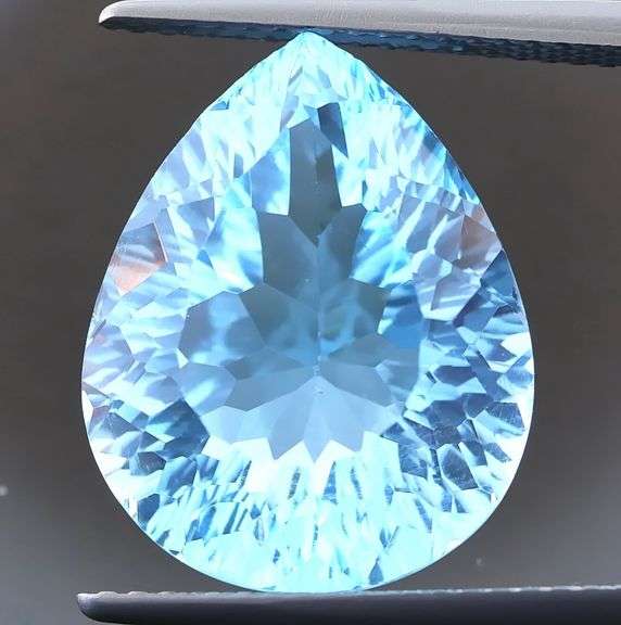 HIGH FIRE FLASHING!!! 12.04ct VS top Swiss blue Topaz!!!