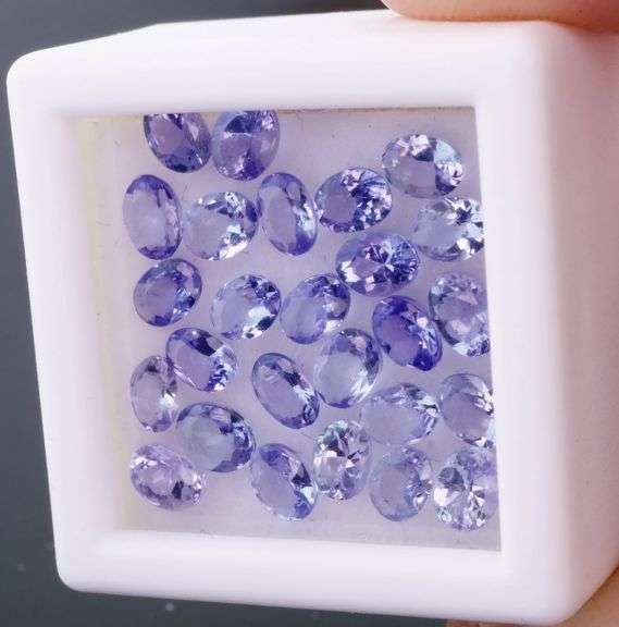 Heavy flashing! Untreated! 4.75ct oval cut Tanzanite set!