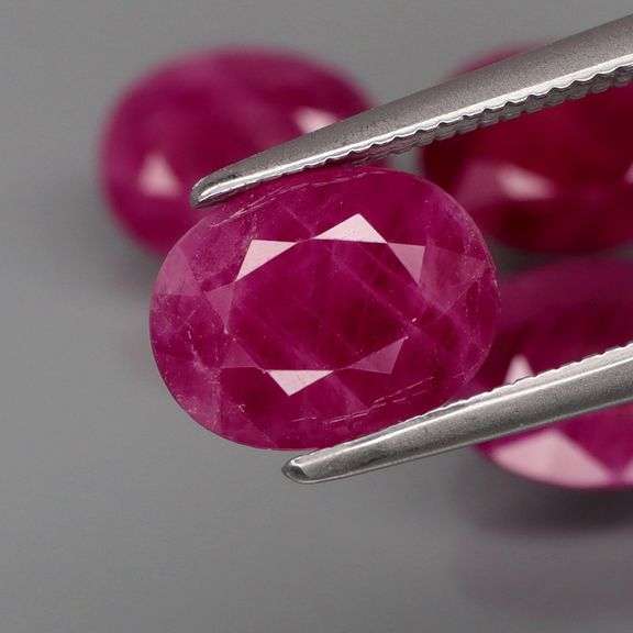 Deep color in this heavy 8.35ct Violet red Ruby set!!!
