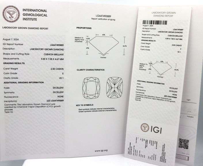 18kt White gold 2.55ct Cushion cut lab grown and 0.55ctw diamond under halo wedding set