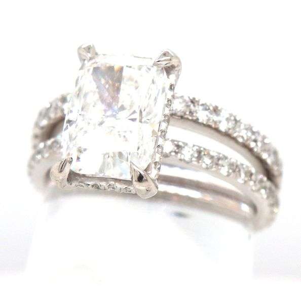 18kt White gold 2.55ct Cushion cut lab grown and 0.55ctw diamond under halo wedding set