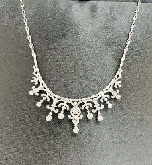 Most Beautiful bridal necklace in sterling silver and Dancing Swarovski center.