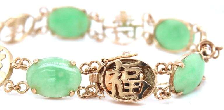 Oval Jade good fortune bracelet in 14kt Yellow gold