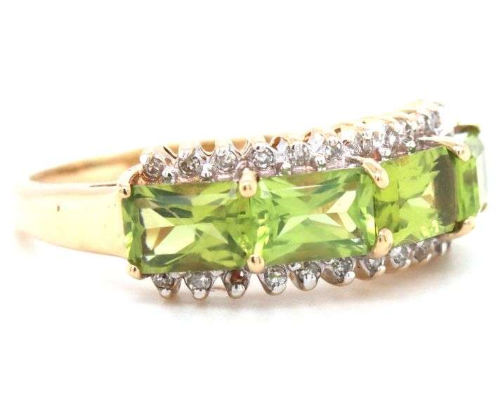 14kt Yellow gold East West emerald cut peridot and diamond 4 stone ring