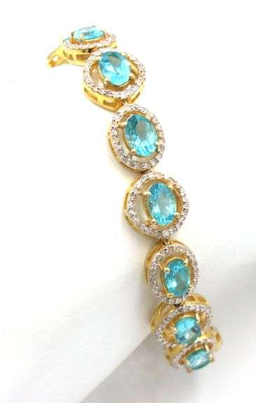 Mesmerizing 11.80CTW Oval Shaped Faceted Apatite & 2.10CTW Diamond Bracelet in 14K Yellow Gold Over 
