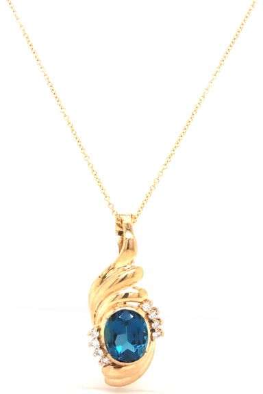 14kt Yellow gold oval London topaz and diamond enhancer pendant on chain