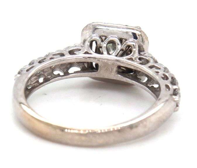 14kt White gold 1ct princess cut in 0.50ctw diamond halo diamond shank setting
