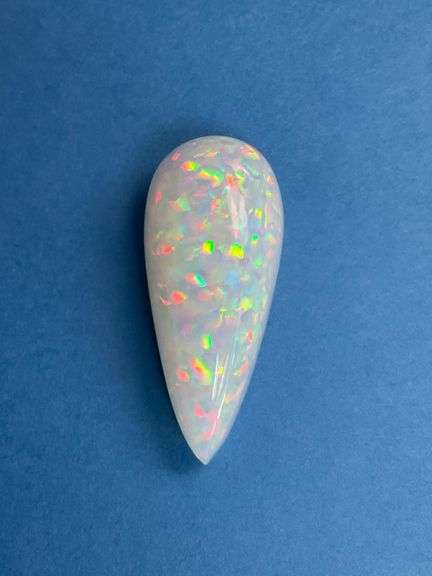 HUGE NATURAL OPAL - 21.05 CARATS PEAR CABOCHON CUT