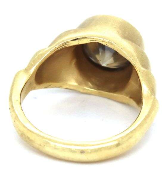 18kt Yellow gold round brilliant cut bezel set diamond ring