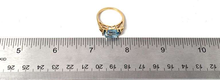 Elegant 10K Yellow Gold Blue Topaz Gemstone Ring with Diamond Accents