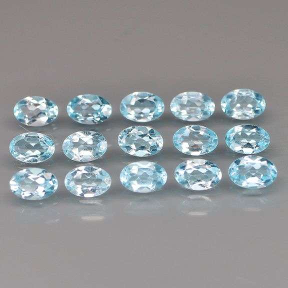 Why aren't you sparkling yet? Get this 8.23ct blue Topaz set!