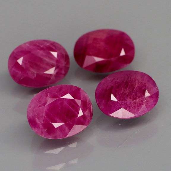 Deep color in this heavy 8.35ct Violet red Ruby set!!!