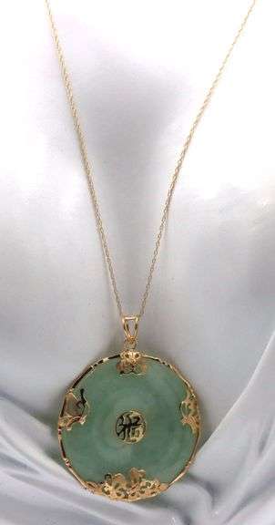 14kt Yellow gold round Jade Fortune pendant on chain