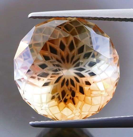 Intricately cut! 19.61ct REAL Imperial Topaz!