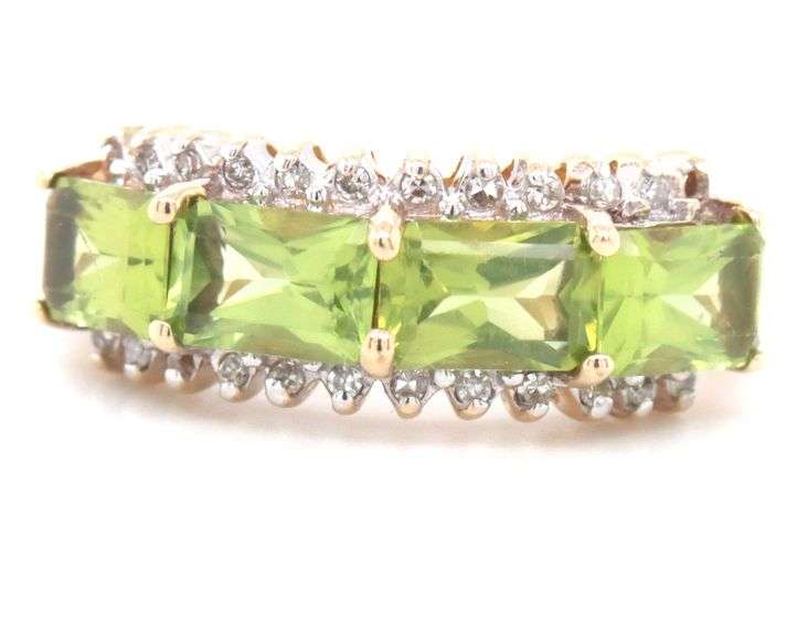 14kt Yellow gold East West emerald cut peridot and diamond 4 stone ring