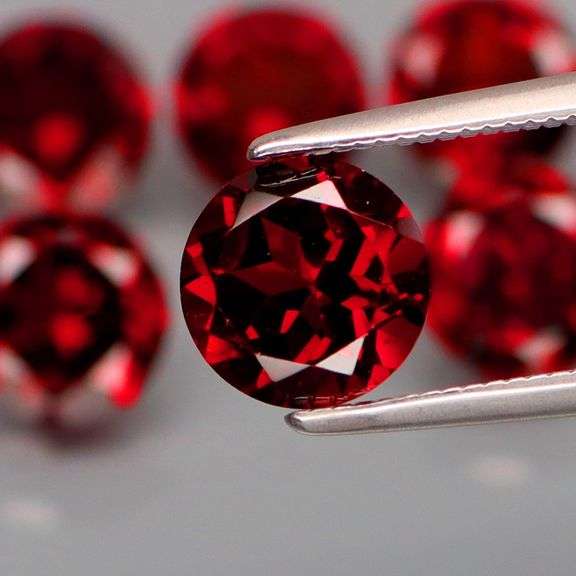 LOOK! It’s a whole set of Mozambique Garnet solitaires! 8.95 carats of them!
