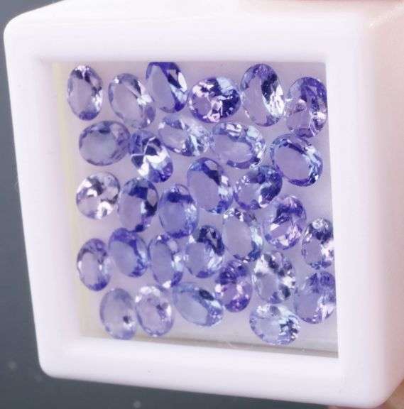 Heavy flashing! Untreated! 4.84ct oval cut Tanzanite set!
