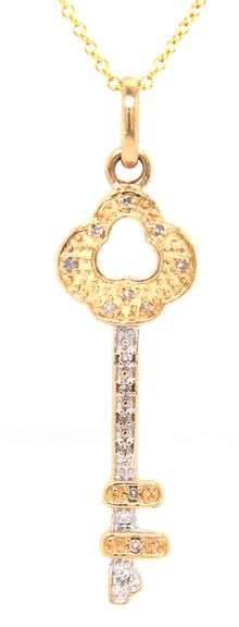 14kt Two tone gold diamond key pendant on chain