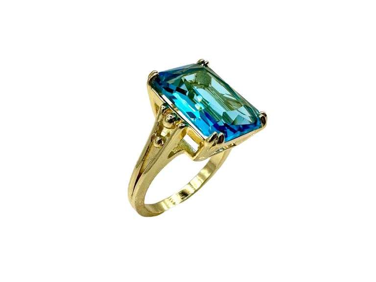 Breathtaking 14 kt Yellow Gold Plate 6.5 Ct Simulated Swiss Blue Topaz Ring