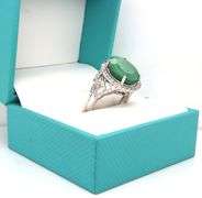 Darling 8.63CTS Oval Faceted Natural Emerald & 1.22 White Sapphire Ring in Sterling Silver