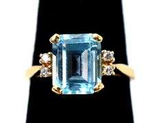 Stunning 10k Yellow Gold Blue Topaz Gemstone Ring with Diamond Accents