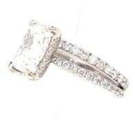18kt White gold 2.55ct Cushion cut lab grown and 0.55ctw diamond under halo wedding set