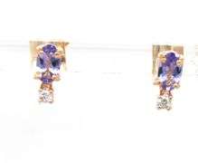 14kt Yellow gold oval tanzanite and diamond stud earrings