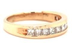 Glittering 14K YG Band with Channel Set Princess Cut Diamonds