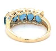 10kt Yellow gold oval blue topaz 5 stone ring
