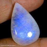 Eye catching 23.12ct smoky white Moonstone with strong blue flashing!