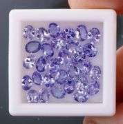 Heavy flashing! Untreated! 4.84ct oval cut Tanzanite set!