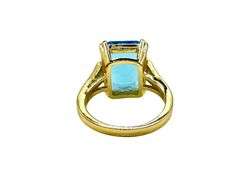 Breathtaking 14 kt Yellow Gold Plate 6.5 Ct Emerald Cut Simulated Swiss Blue Topaz Ring