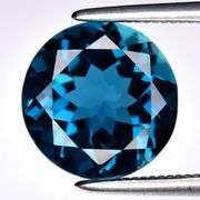 Top London blue! 3ct 9mm VVS grade Brazilian Topaz solitaire!