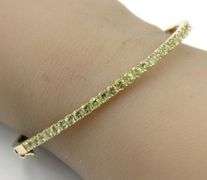 14kt Yellow gold round Peridot bangle bracelet