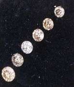 Graduated! 6 piece set of champagne diamonds weighing .44 carats!