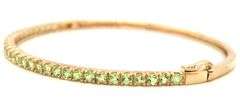 14kt Yellow gold round Peridot bangle bracelet