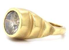 18kt Yellow gold round brilliant cut bezel set diamond ring