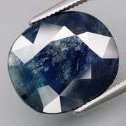 Huge! Striated color! Silver sheen! 9.52ct natural Sapphire!