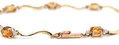 14kt Yellow gold oval citrine woven link station bracelet