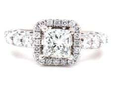 14kt White gold 1ct princess cut in 0.50ctw diamond halo diamond shank setting