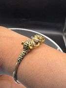 VINTAGE 1980s 18K GOLD LEOPARD BANGLE WITH DIAMONDS & RUBIES