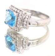 14kt White Gold approximate 1.60ct Blue Topaz and 0.30ctw Diamond Ring