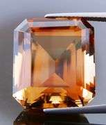 Electric flashing through rich color! Huge 34.99ct Imperial Topaz!