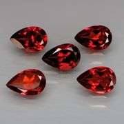 Heavy! 7.56ct well matched untreated Garnet set!