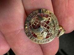 10K Yellow Gold Globe "The World Is Yours" Pendant