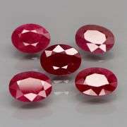 Deep color in this heavy 7.28ct Violet red Ruby set!!!