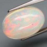 Snow white and filled with color! 7.74ct untreated opal!!!
