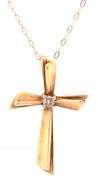 10kt Yellow gold diamond cross pendant on chain