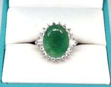 Sparkling 8.63CTS Oval Faceted Emerald & 1.11CTW White Sapphire Ring in Sterling Silver
