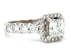14kt White gold 1ct princess cut in 0.50ctw diamond halo diamond shank setting